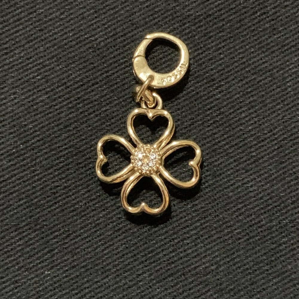 Fossil clover charm